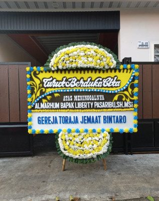 Papan Bunga Duka di Winangun Dua